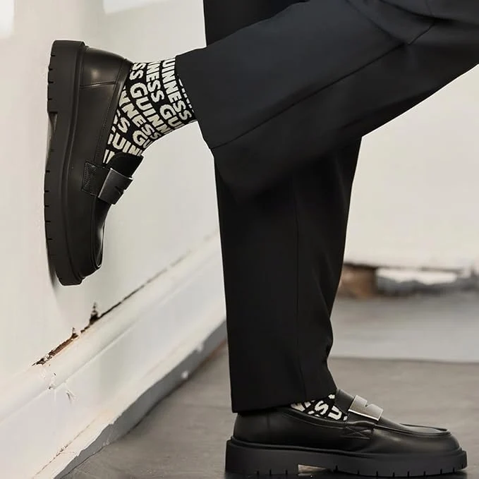 Guinness Crew Socks – Black & White Repeating Logo Design