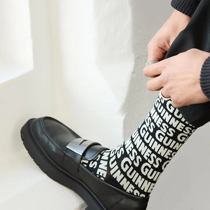 Guinness Crew Socks – Black & White Repeating Logo Design