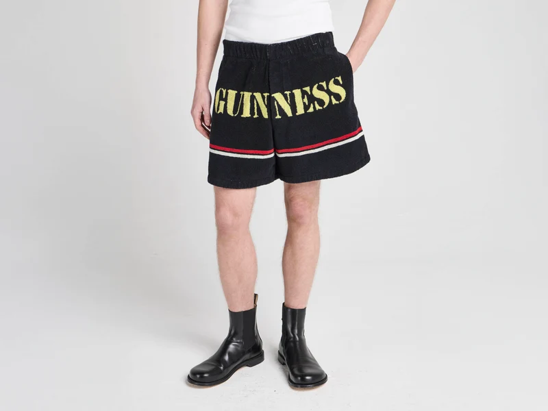 Unisex JW ANDERSON X GUINNESS TOWELLING SHORTS IN BLACK