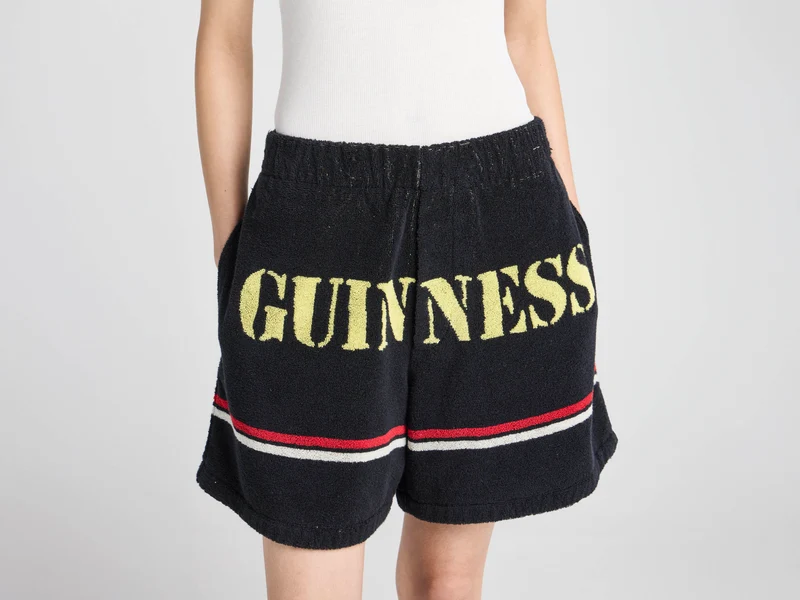 Unisex JW ANDERSON X GUINNESS TOWELLING SHORTS IN BLACK