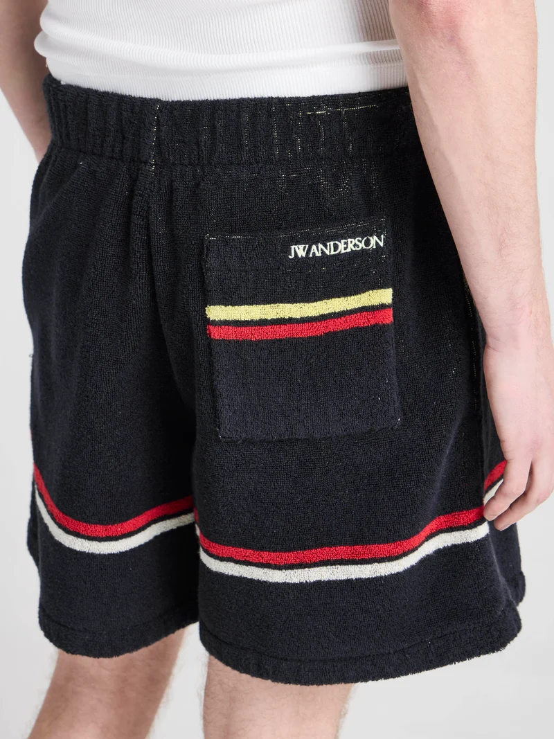 Unisex JW ANDERSON X GUINNESS TOWELLING SHORTS IN BLACK