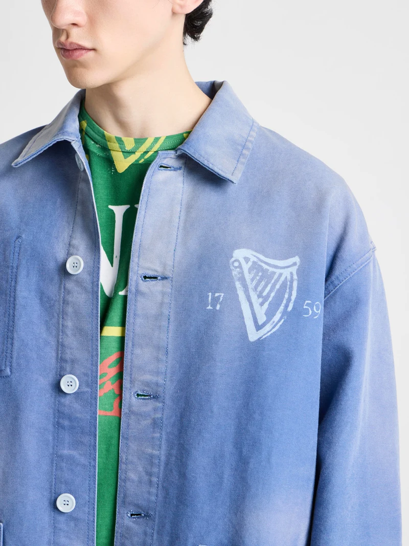Unisex JW ANDERSON X GUINNESS WORKWEAR CHORE JACKET IN MID-BLUE WASHED DENIM