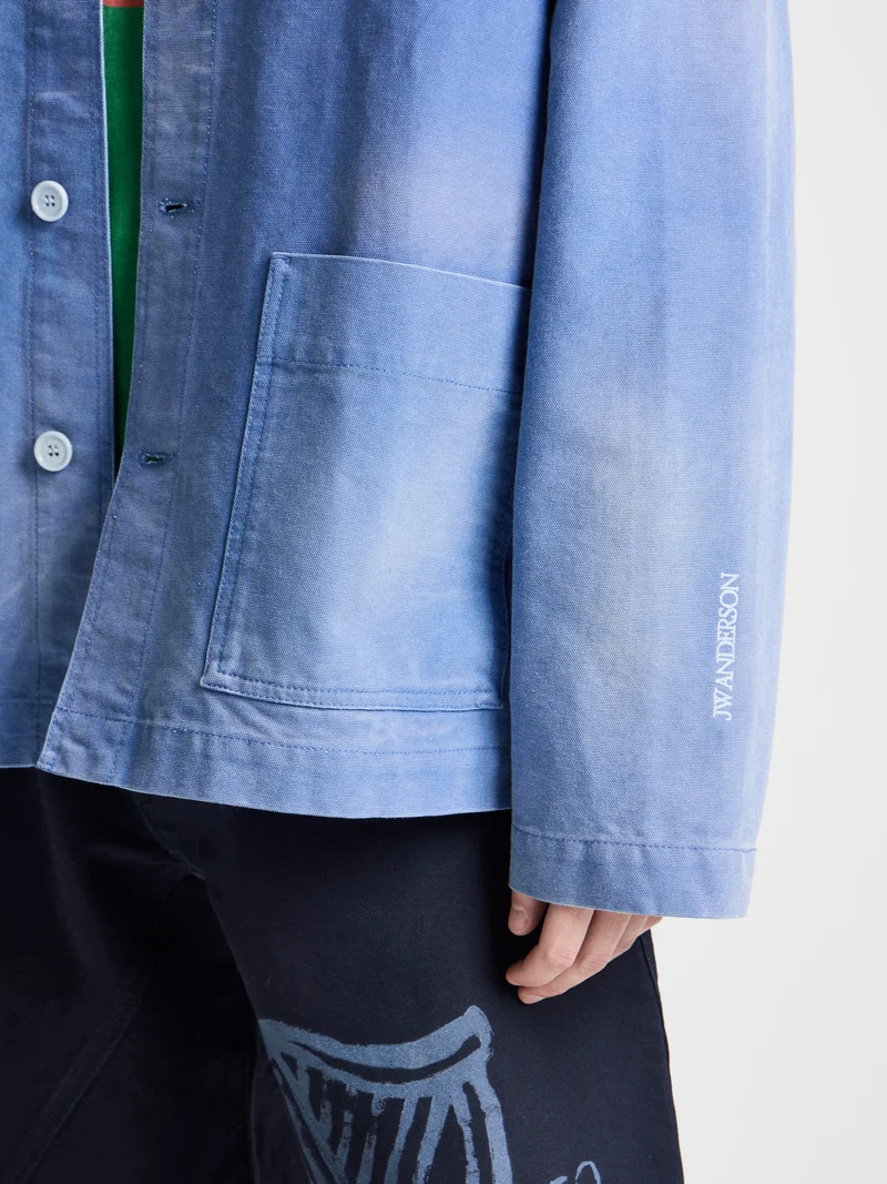 Unisex JW ANDERSON X GUINNESS WORKWEAR CHORE JACKET IN MID-BLUE WASHED DENIM
