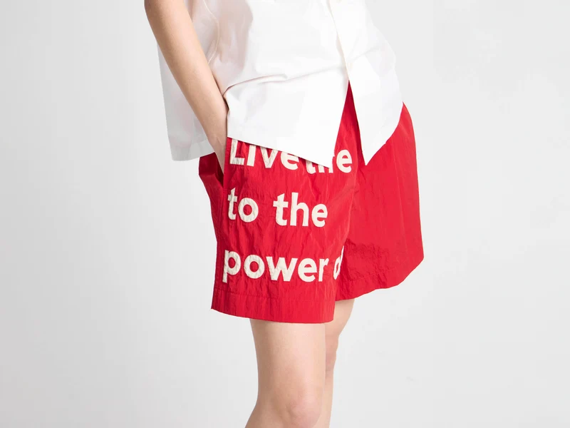 Unisex JW ANDERSON X GUINNESS SLOGAN TRACK SHORTS IN RED