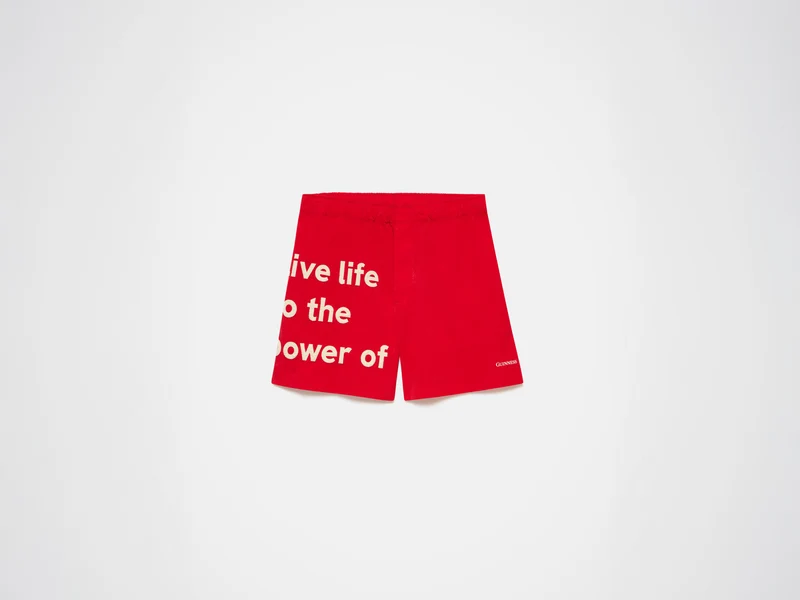 Unisex JW ANDERSON X GUINNESS SLOGAN TRACK SHORTS IN RED
