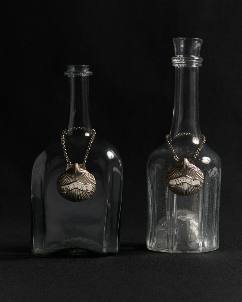 GEORGE III SILVER SHELL WINE LABEL [CLARET] IN SILVER