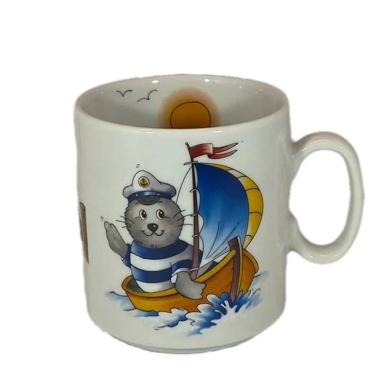Tasse, Porzellan, Robbe „Segler, Seefahrer - Steg“ mit Wunschnamen - Jeder Name ist möglich!