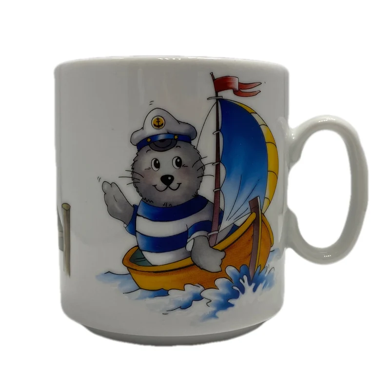 Tasse, Porzellan, Robbe „Segler, Seefahrer - Steg“ mit Wunschnamen - Jeder Name ist möglich!