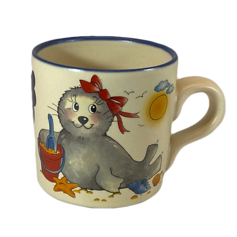 Tasse, Keramik, Robbe „Mädchen“ mit Wunschnamen - Jeder Name ist möglich!