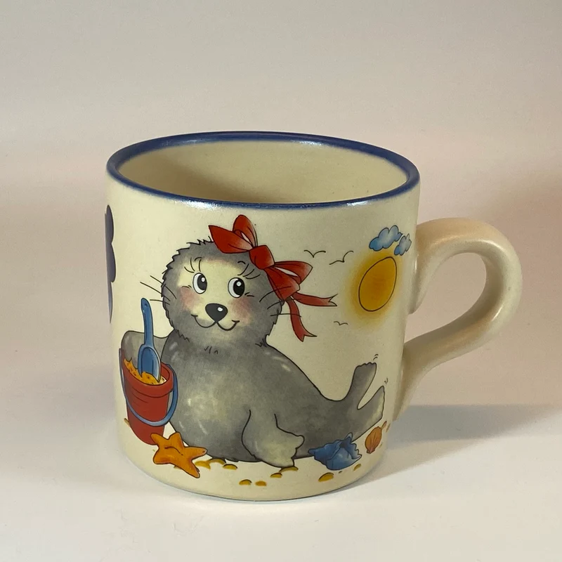 Tasse, Keramik, Robbe „Mädchen“ mit Wunschnamen - Jeder Name ist möglich!