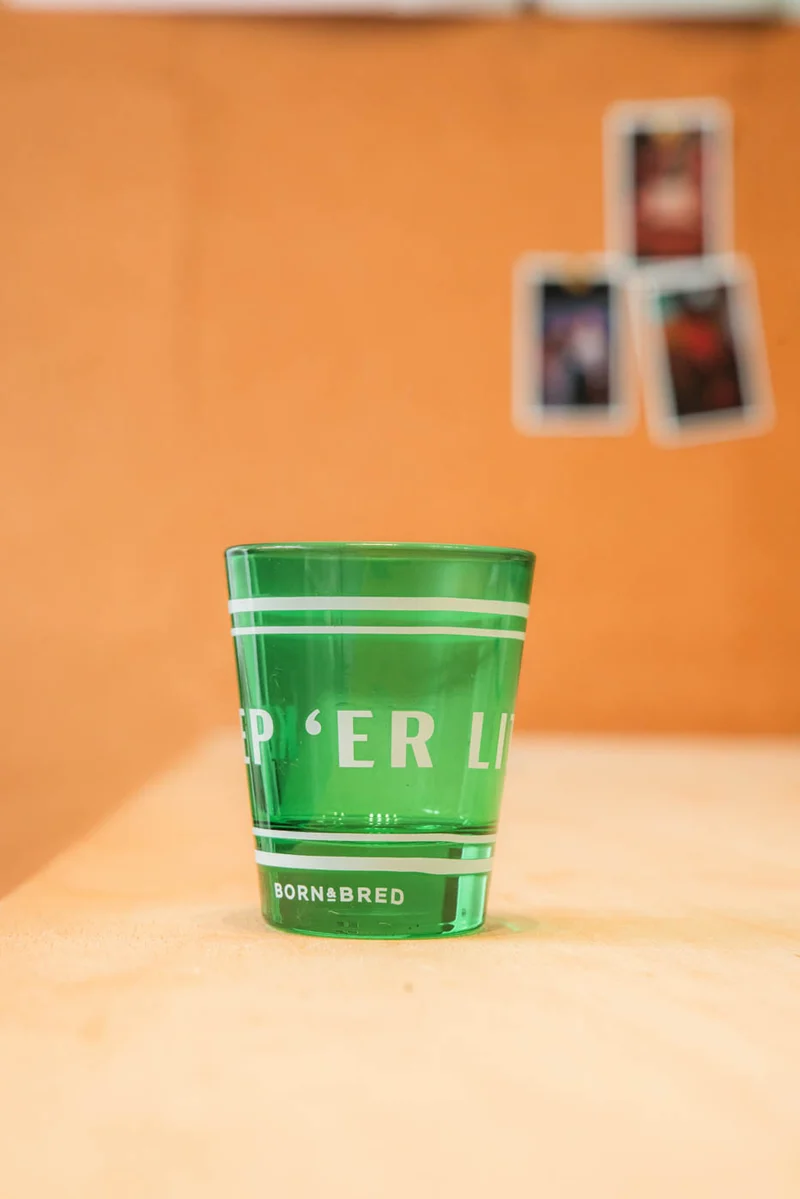 Keep 'Er Lit Shot Glass | Born & Bred
