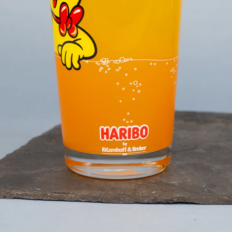 HARIBO Trinkglas Goldbär Motiv | 380 ml Glas in Orange oder Grün für Kinder, Erwachsene & Fans