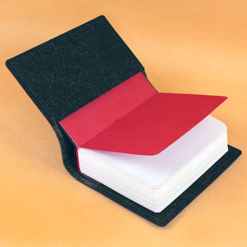 Personalisierte Buchhülle für Gotteslob & Gesangbuch mit Watercolor Kreuz | Anthrazit oder Orange