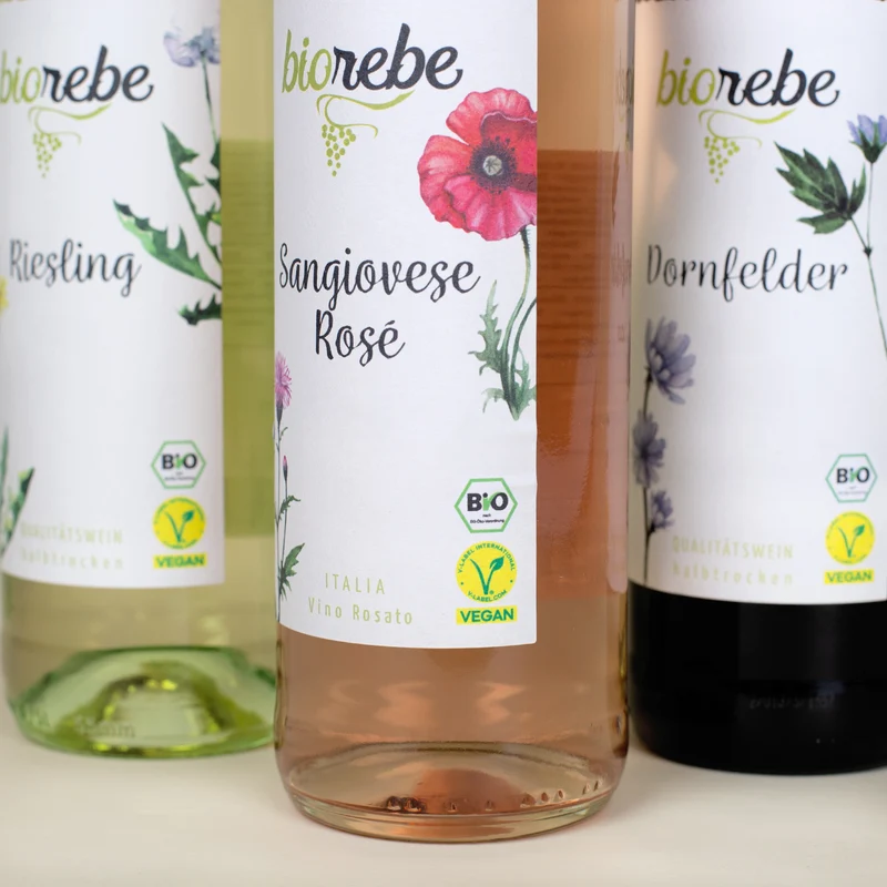 Weinflasche mit persönlichem Etikett und Foto zu Weihnachten | Biorebe Wein als Geschenk
