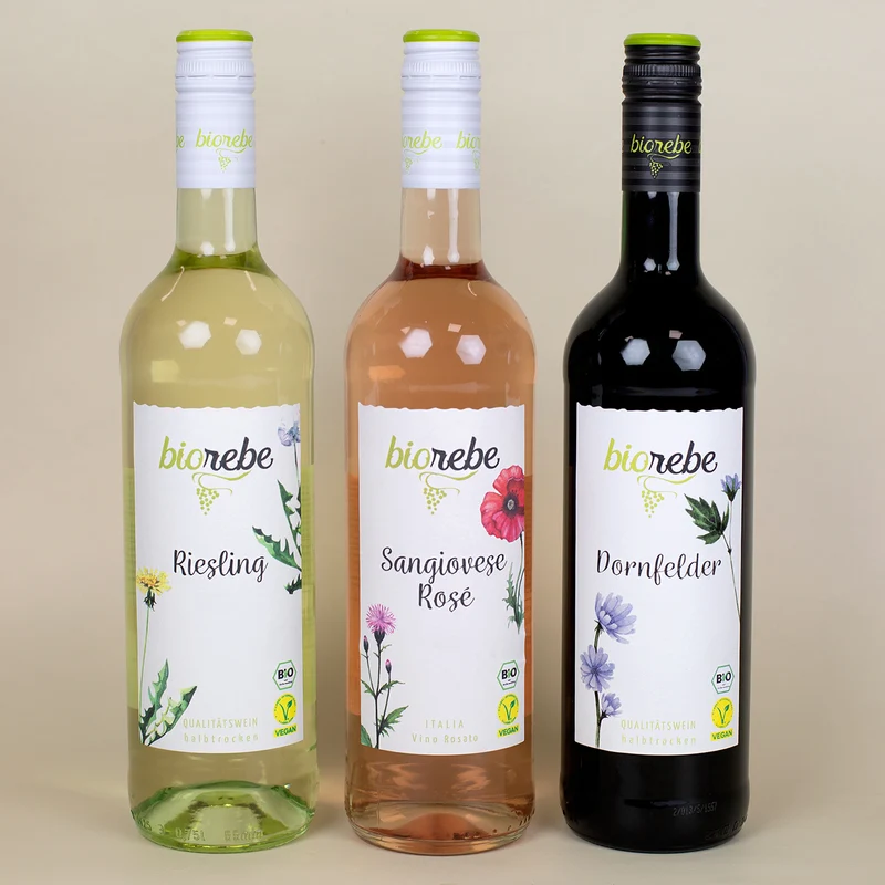 Weinflasche mit persönlichem Etikett und Foto zu Weihnachten | Biorebe Wein als Geschenk