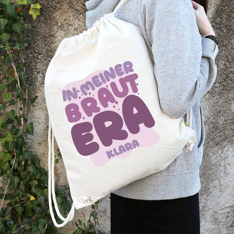 JGA Baumwoll-Rucksack mit Wunschname für die Braut-to-be | Schwarz & Natur