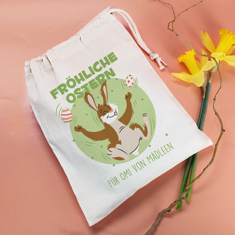 Personalisierter Geschenksack zu Ostern „Fröhliche Ostern“ mit jonglierendem Osterhasen