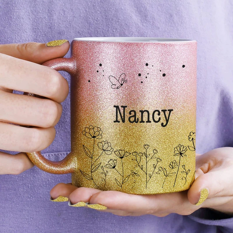 Glitzertasse mit Blumenwiese und Ihrem Wunschnamen bedruckt