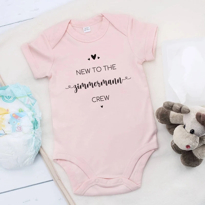 Rosa Babybody -New to the Crew- persönlich bedruckt