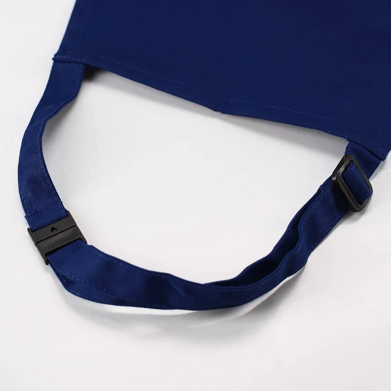 Dunkelblaue Kinderschürze mit Namensaufdruck und Farbklecks-Motiv